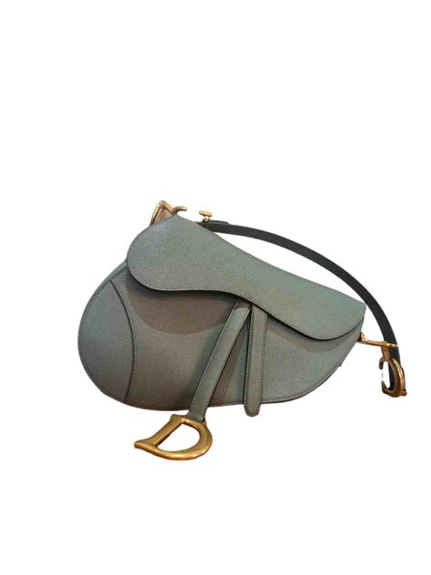 saddle dior verde|Dior saddle bag history.